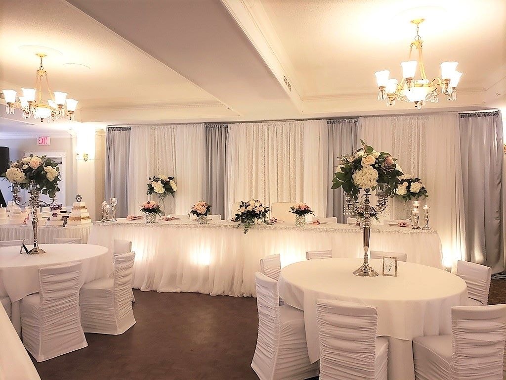 White lace drape ceremony backdrop